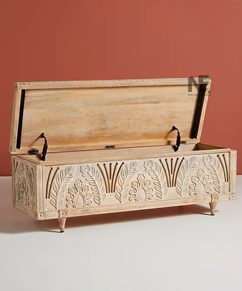 Rectangular wooden trunk with intricate floral relief carving