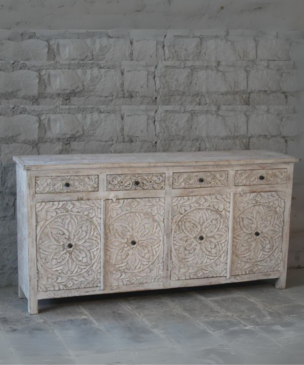 Front view of floral hand-carved white distressed sideboard