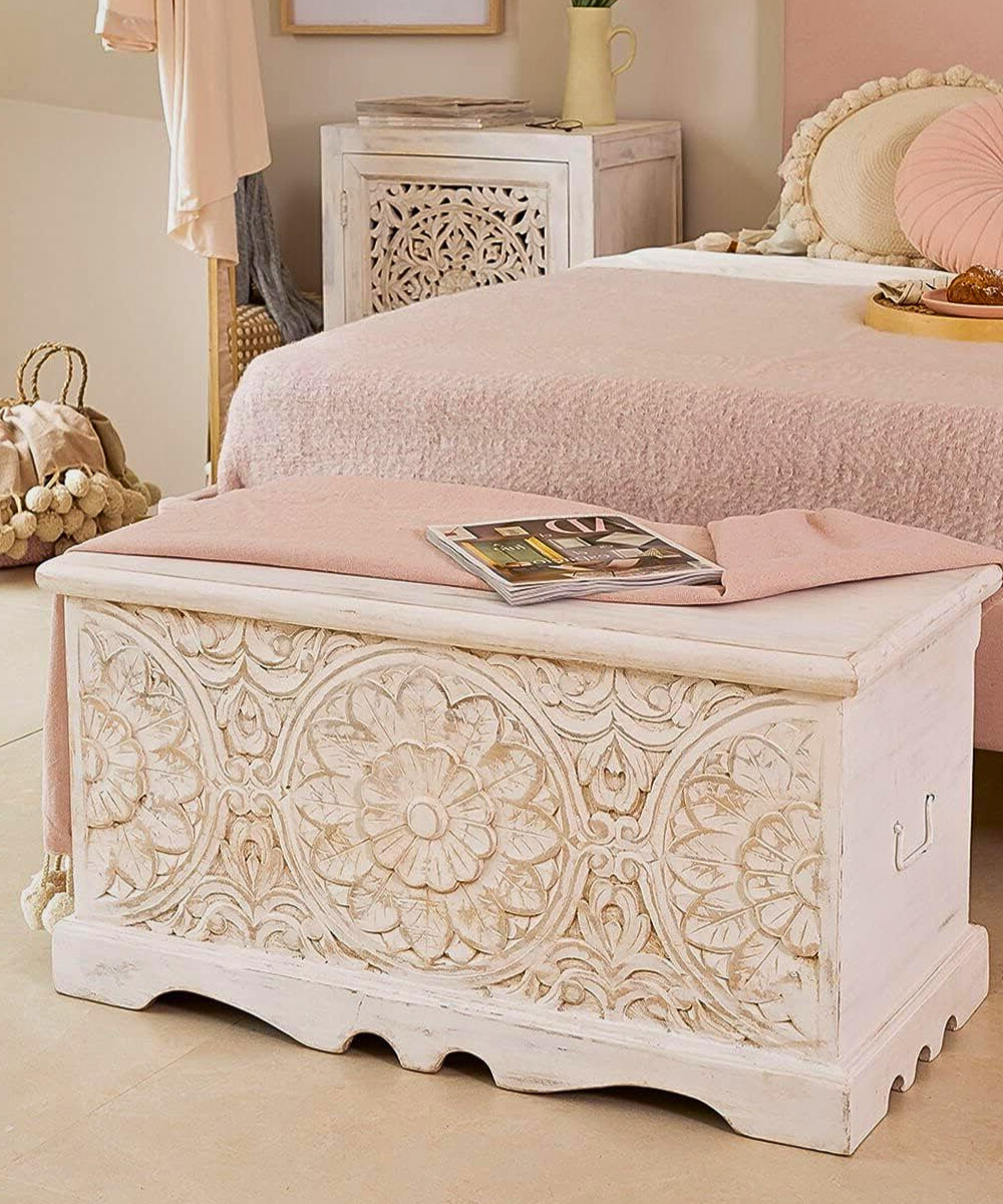 Close-up of the intricate hand-carved details on the white mango wood