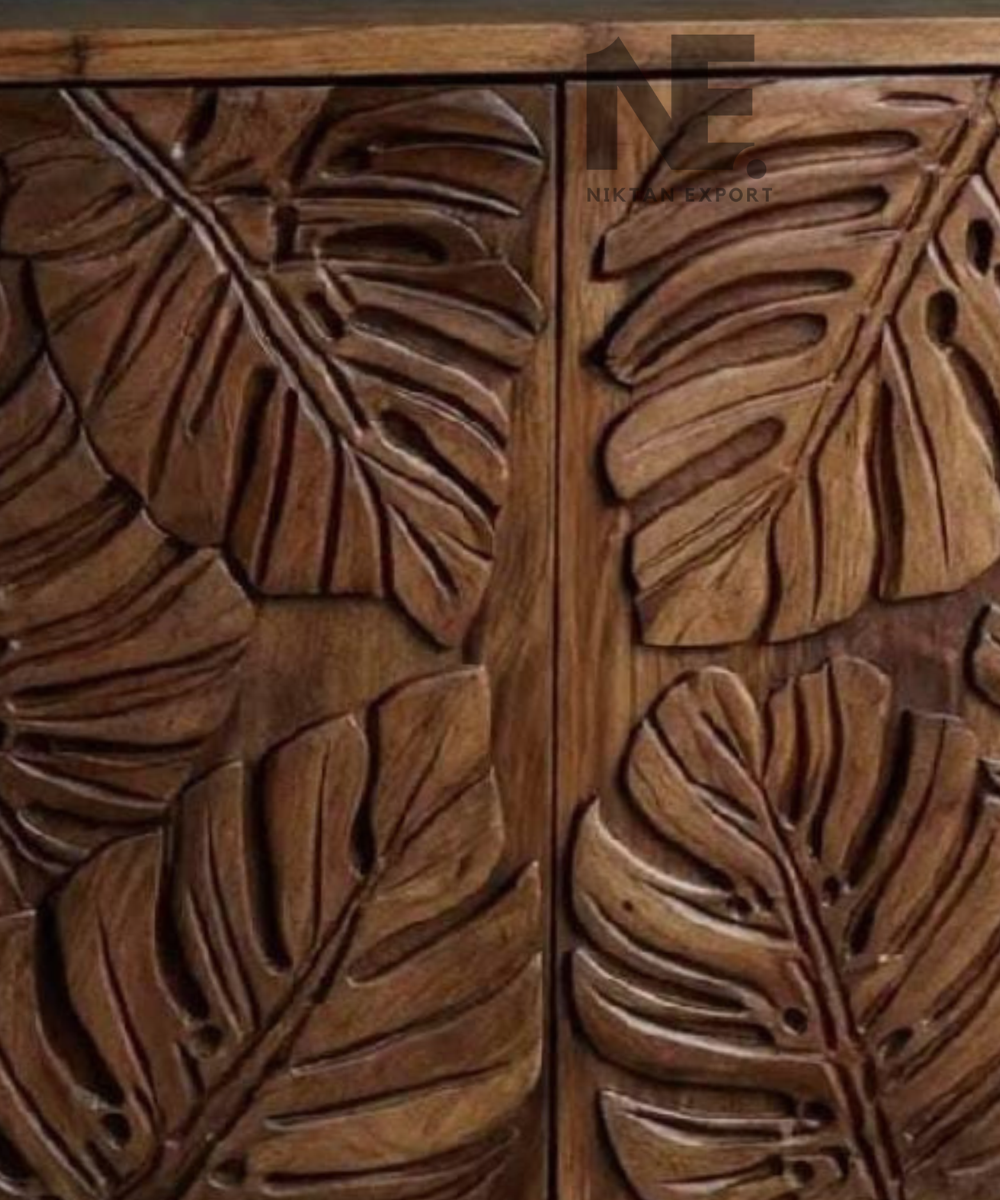 Handle-free doors on custom carved wooden cabinet