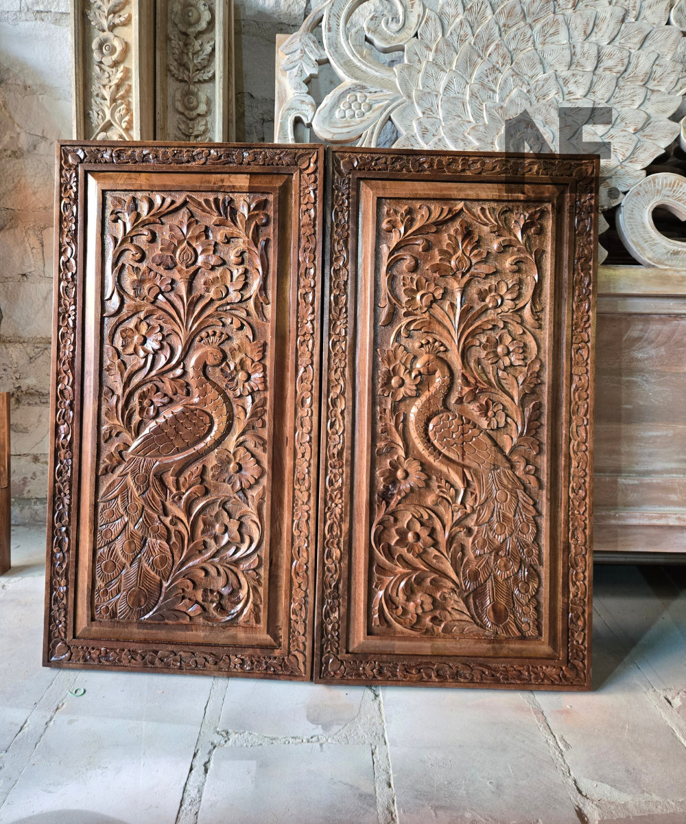 Intricate floral carving on a wooden decorative panel
