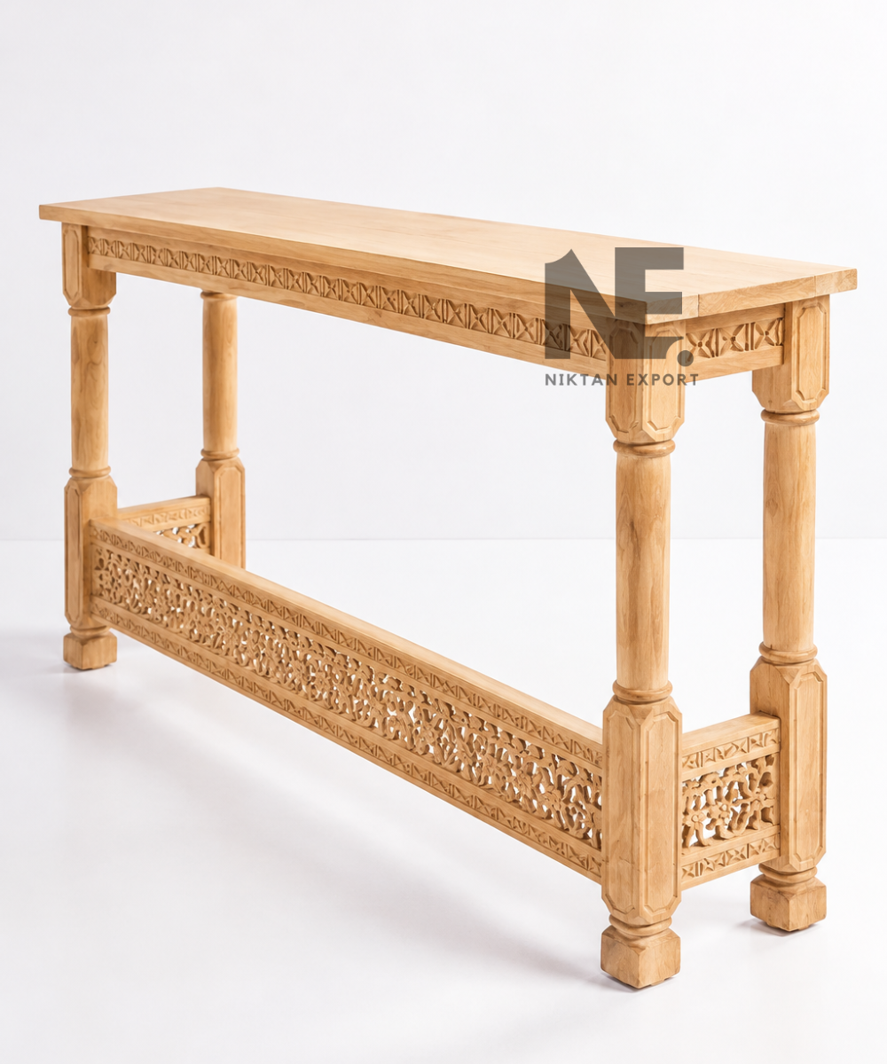 Natural wood console table with carved apron