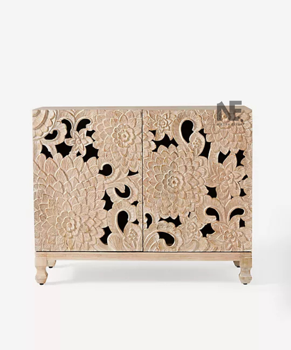 Close-up of floral carving on wooden sideboard doors