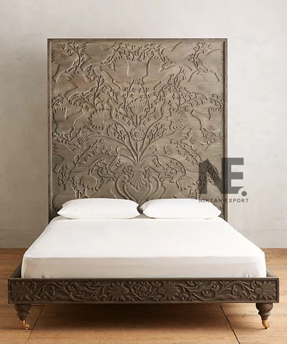 Front view of a carved wooden bed frame