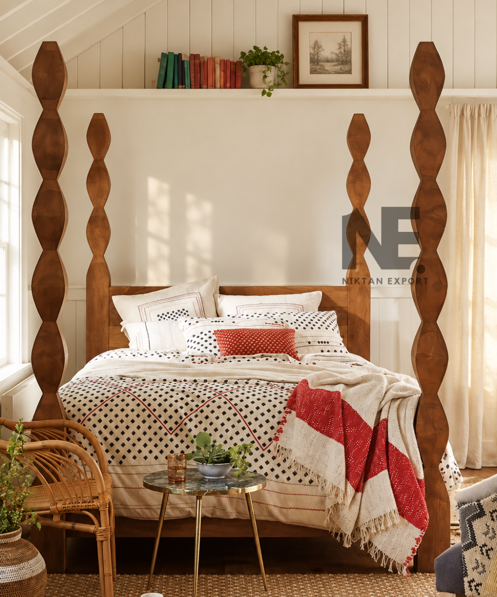 Wooden four poster bed with sculpted posts in natural wood