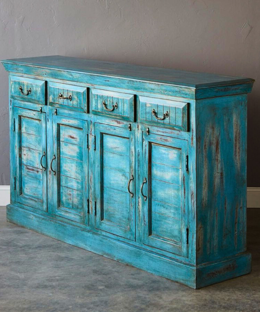 Close-up of intricate carvings on the Azura Sideboard