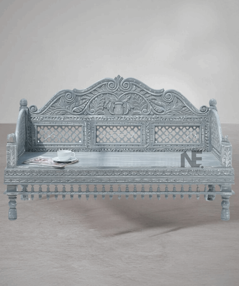 Hand-carved wooden daybed front view
