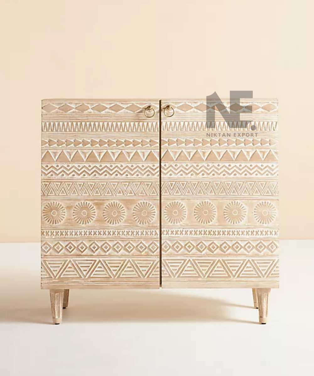 Whitewashed bar cabinet with geometric patterned front