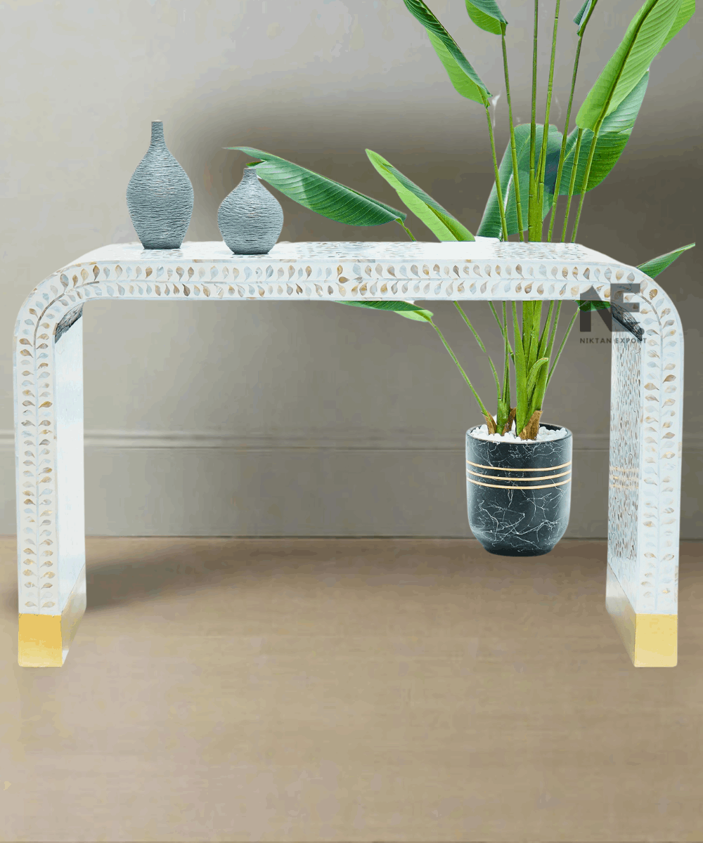 Front view of Mother of Pearl console table with U-shape floral inlay design