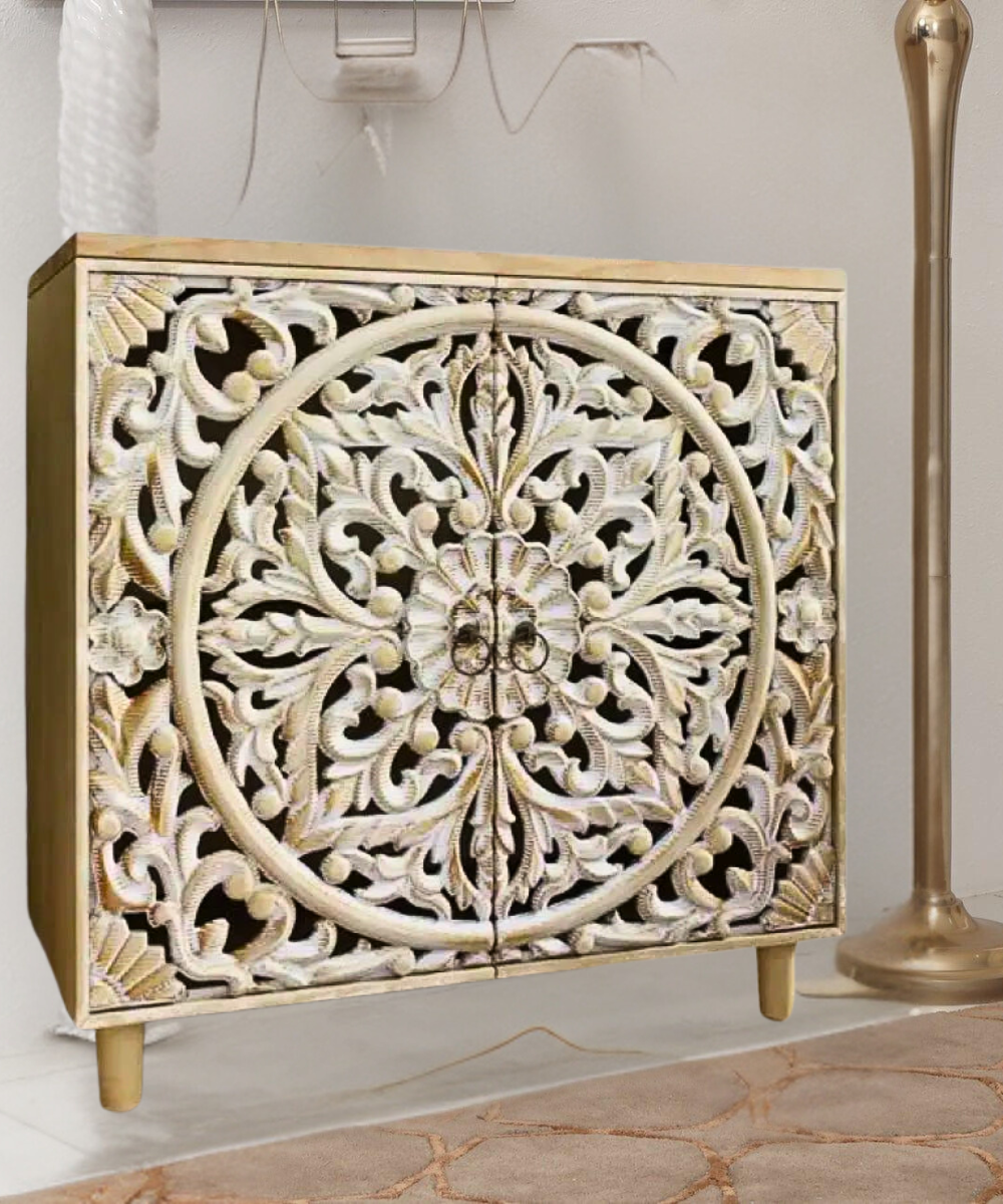 Close-up of drawer with intricate handcarved detailing
