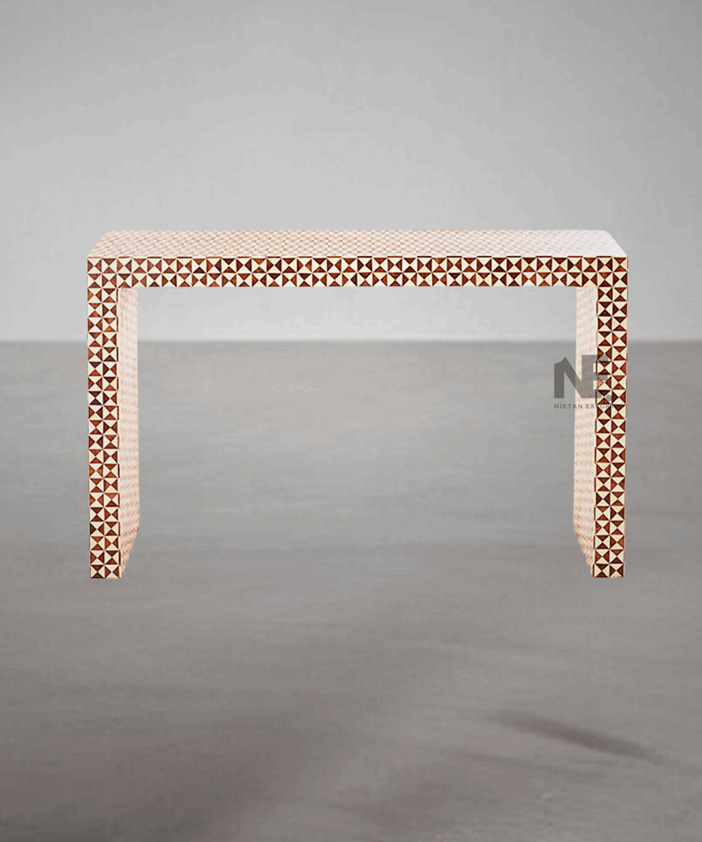 Close-up of white bone inlay pattern on brown surface