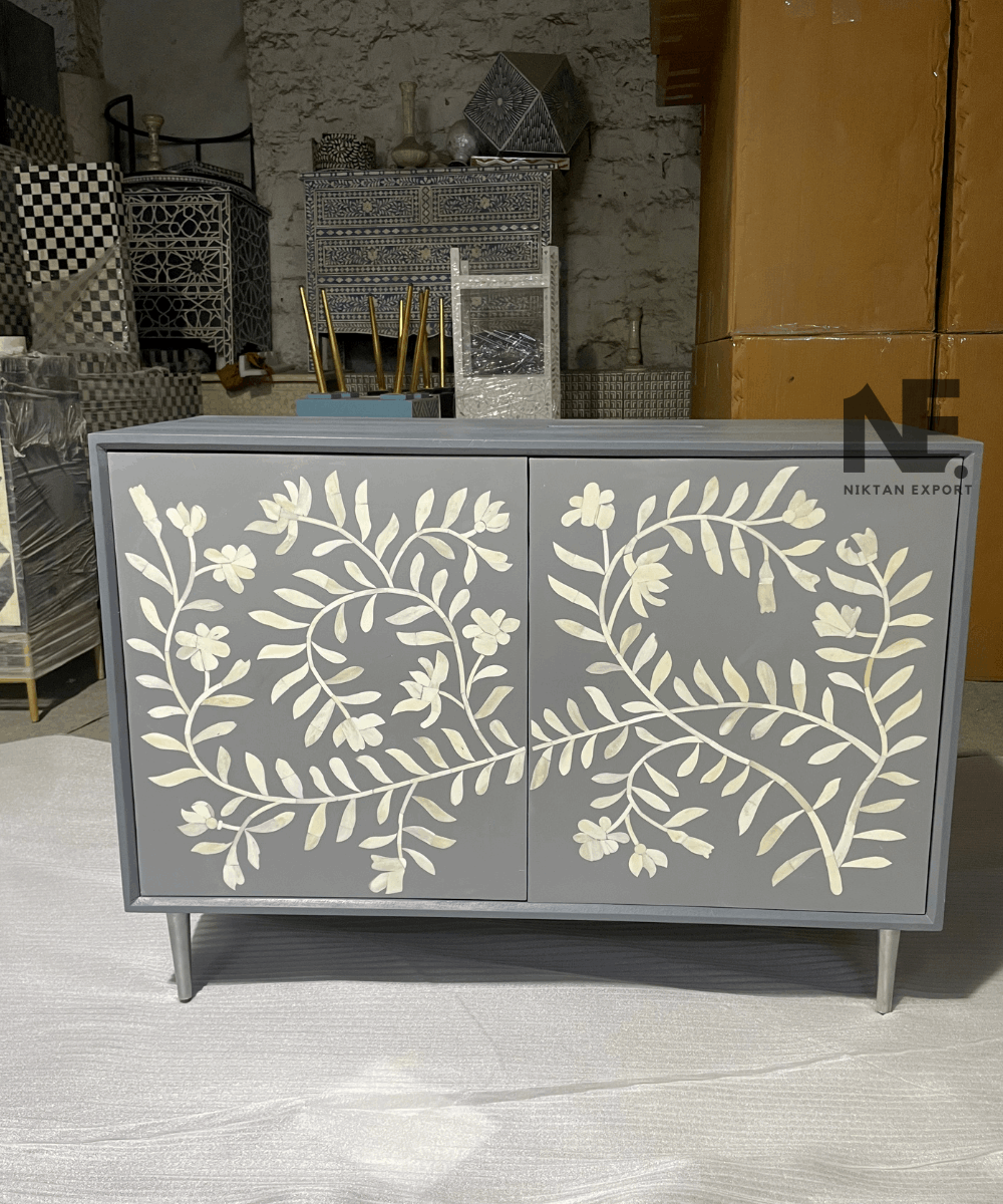 Front view of bone inlay chest of drawers with 2-door cabinet