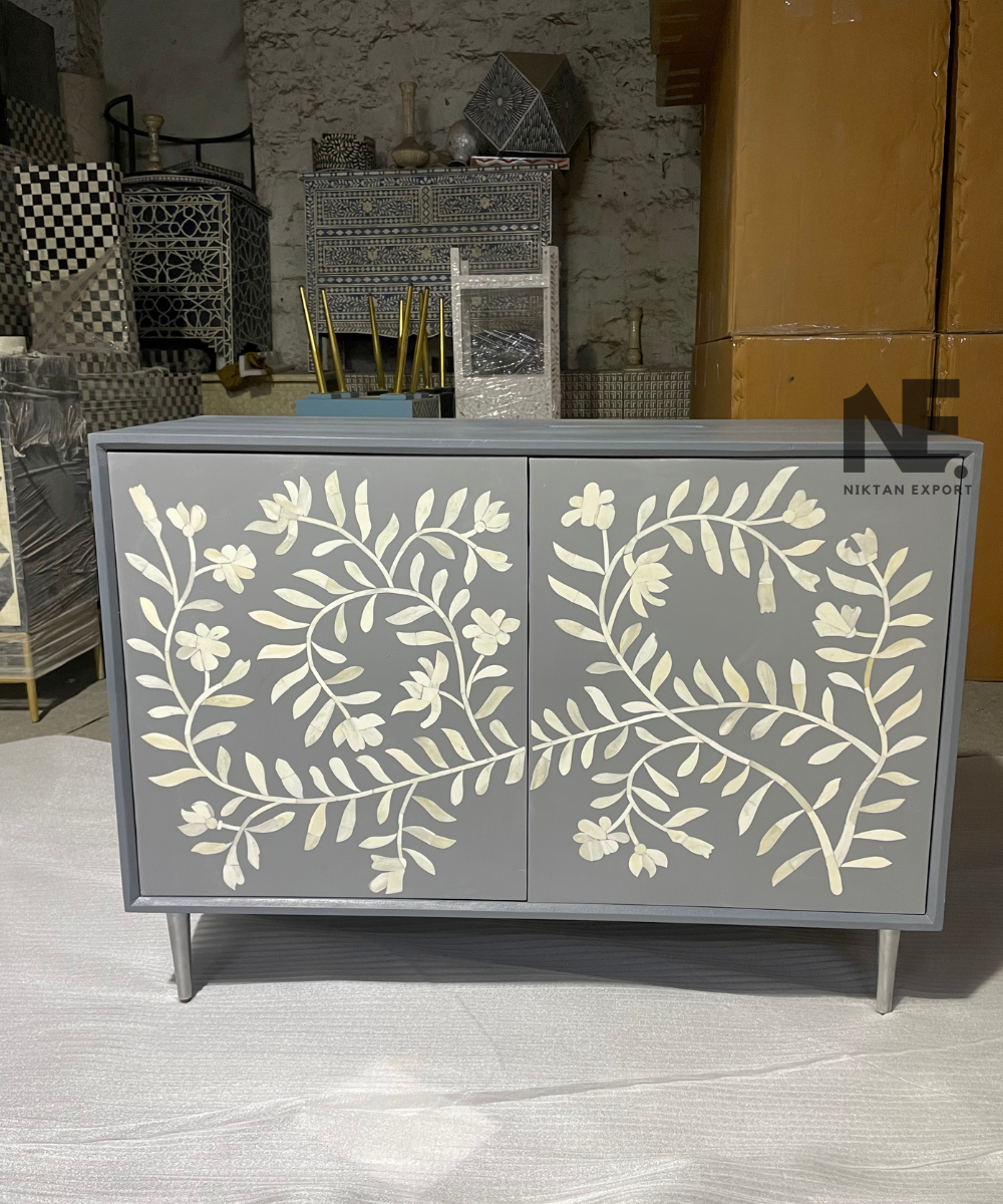 Front view of bone inlay chest of drawers with 2-door cabinet