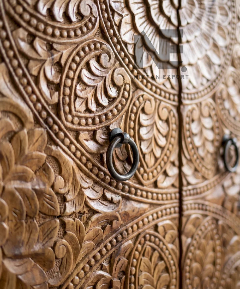 Double-door wooden wardrobe with decorative floral patterns