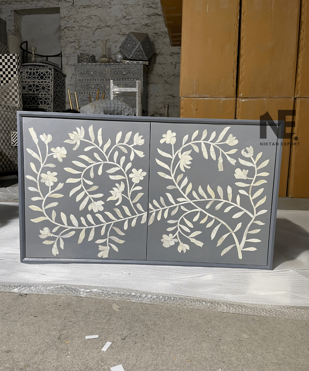 Front view of bone inlay chest of drawers with 2-door cabinet