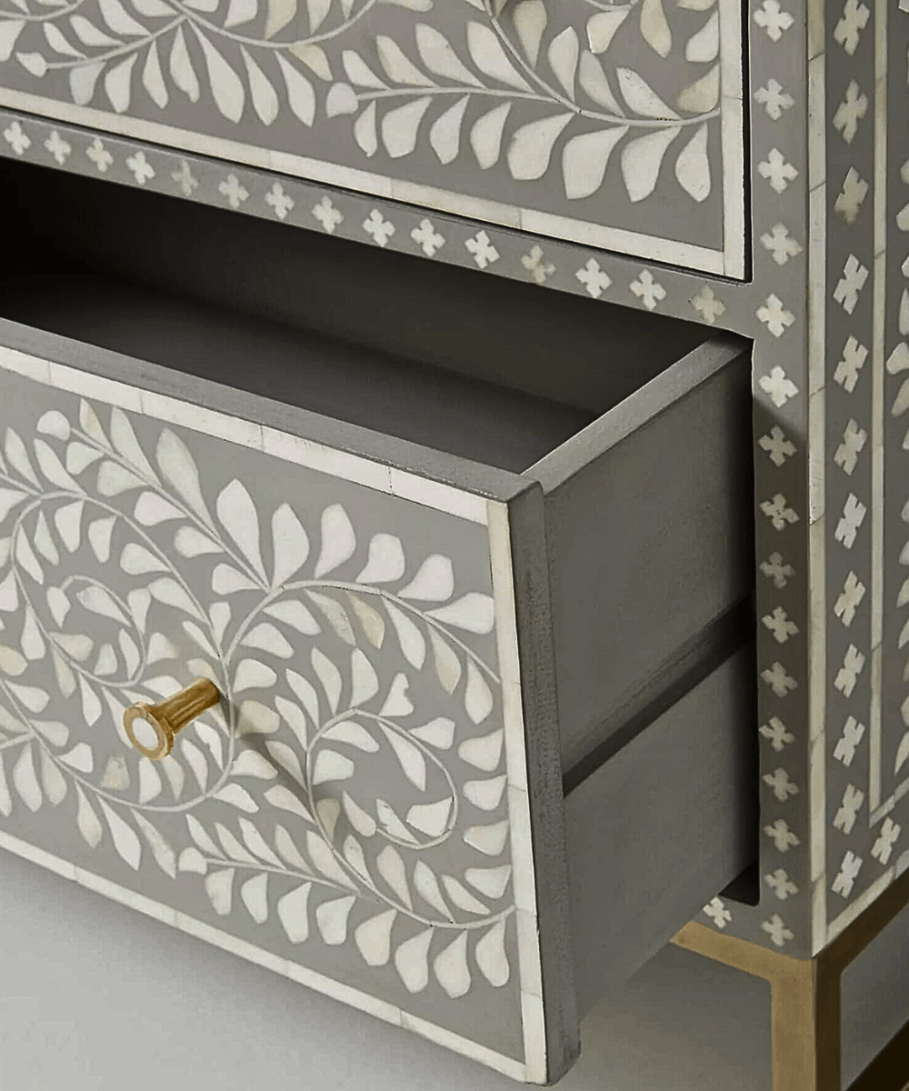 Close-up of intricate grey bone inlay pattern