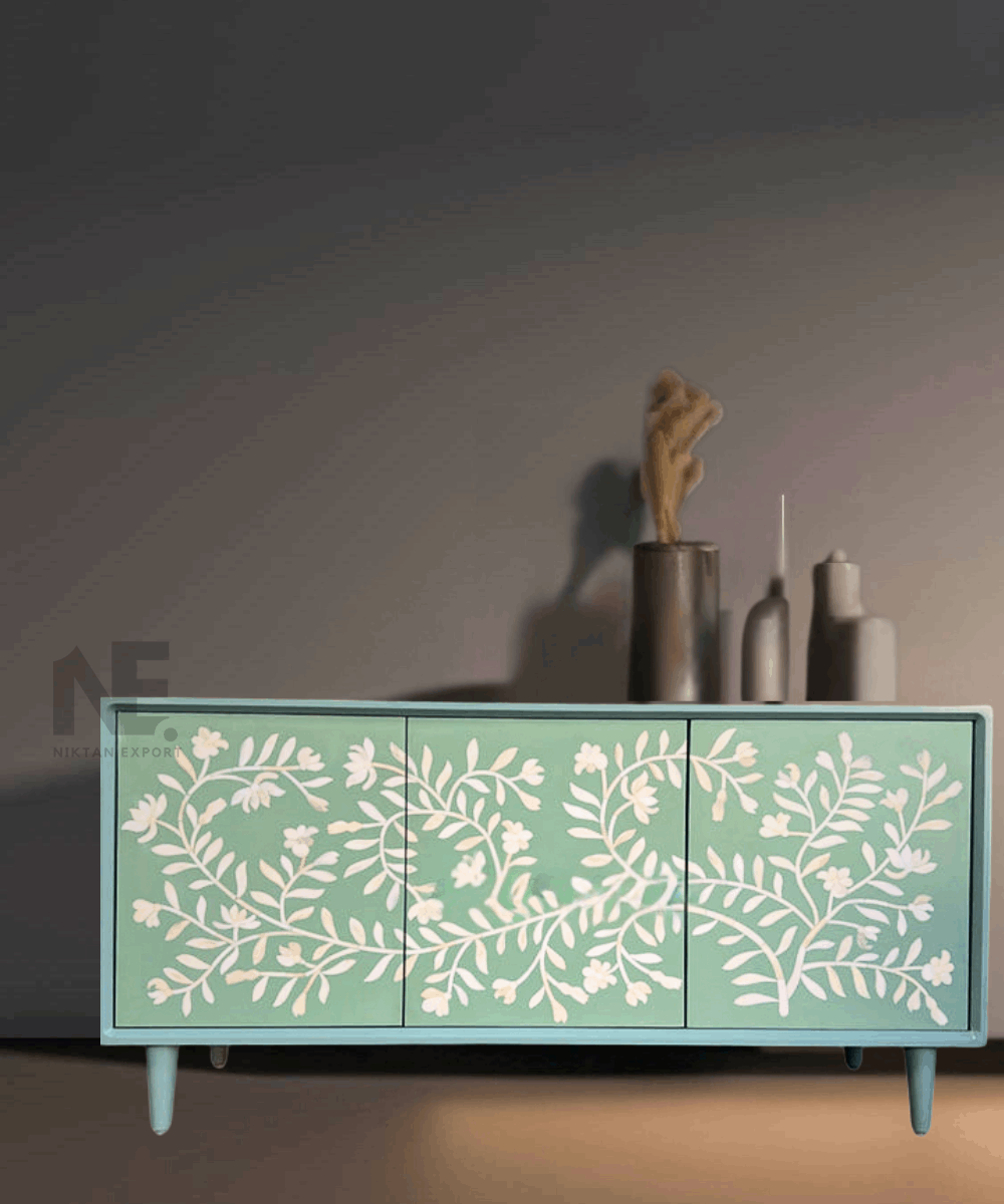 Front view of sage green bone inlay media console with floral pattern
