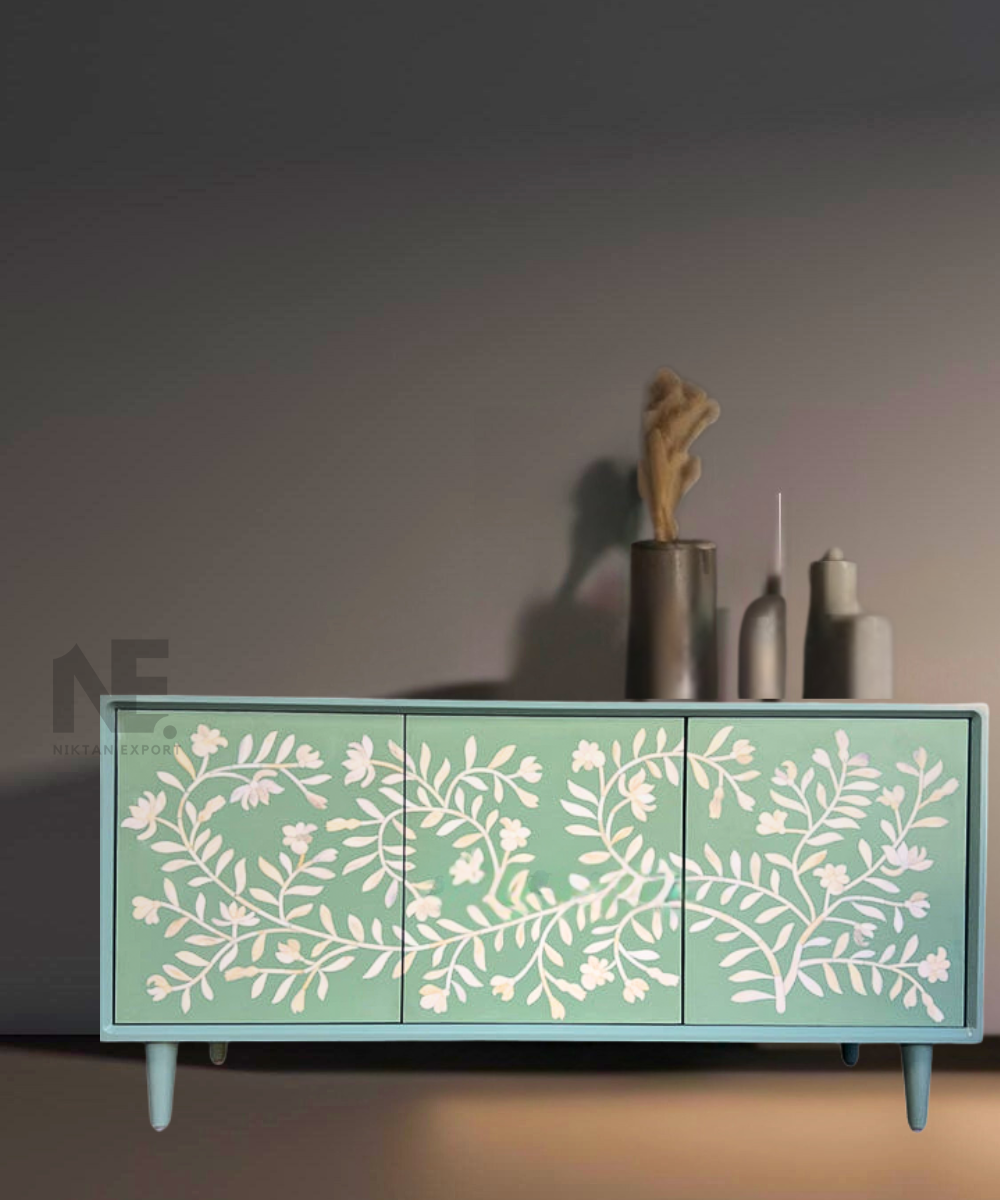 Front view of sage green bone inlay media console with floral pattern