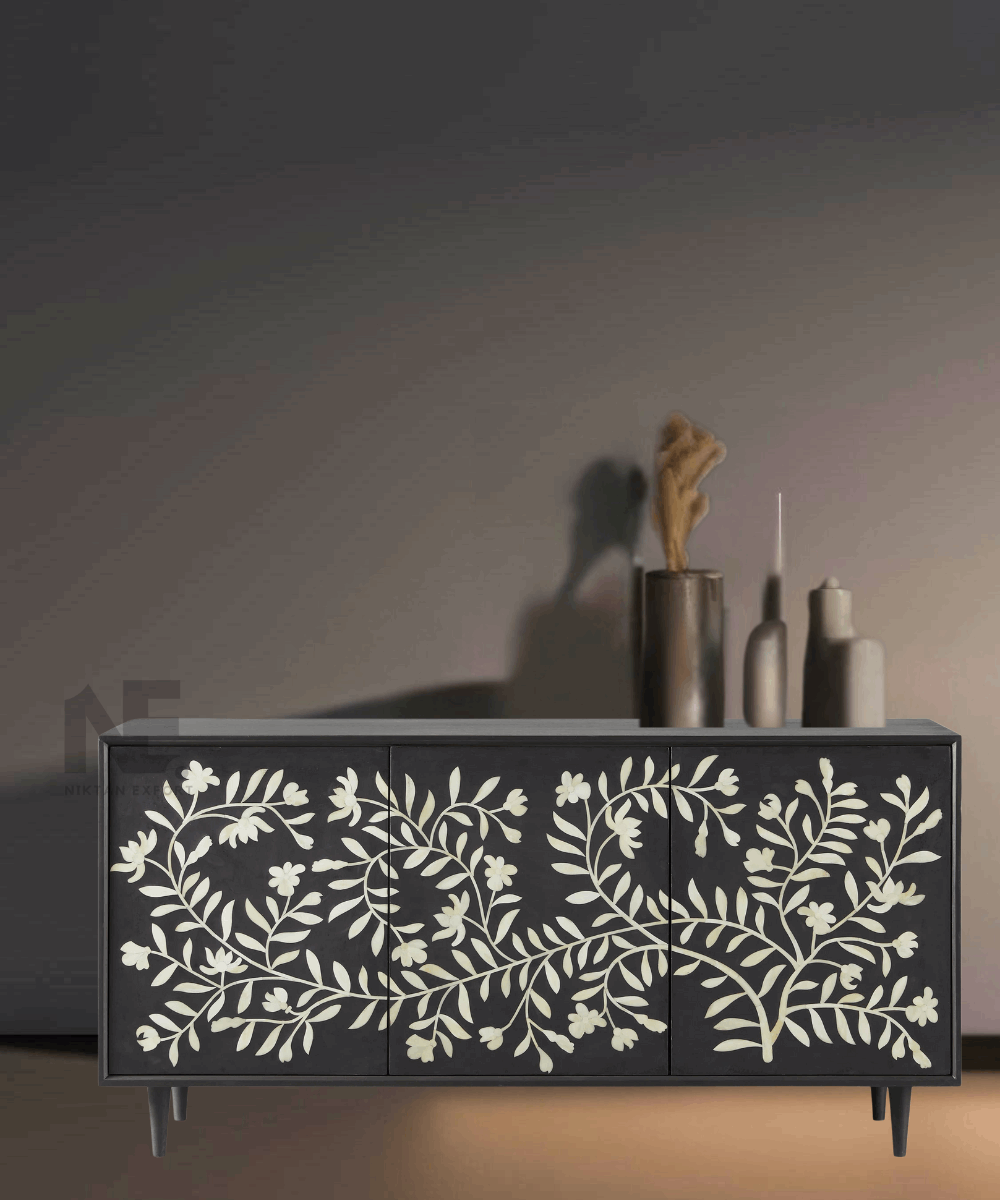 Front view of black bone inlay media console with floral doors