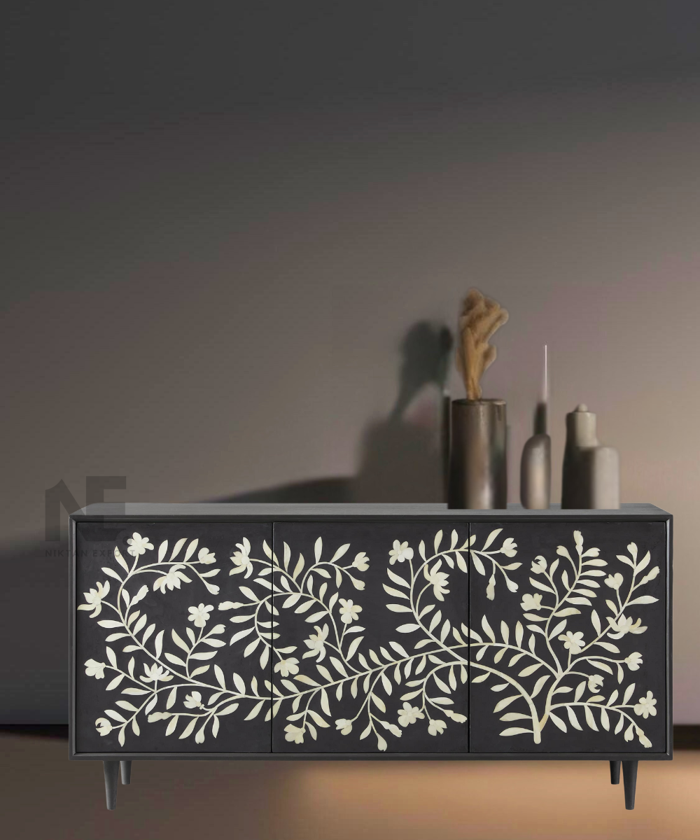Front view of black bone inlay media console with floral doors