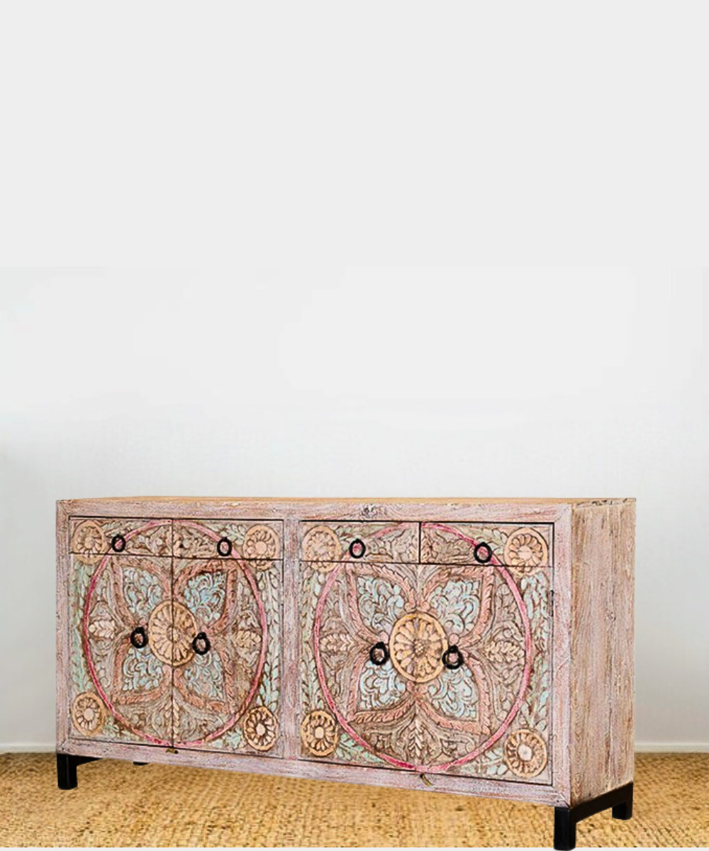 Close-up of intricate carved floral pattern on door panels