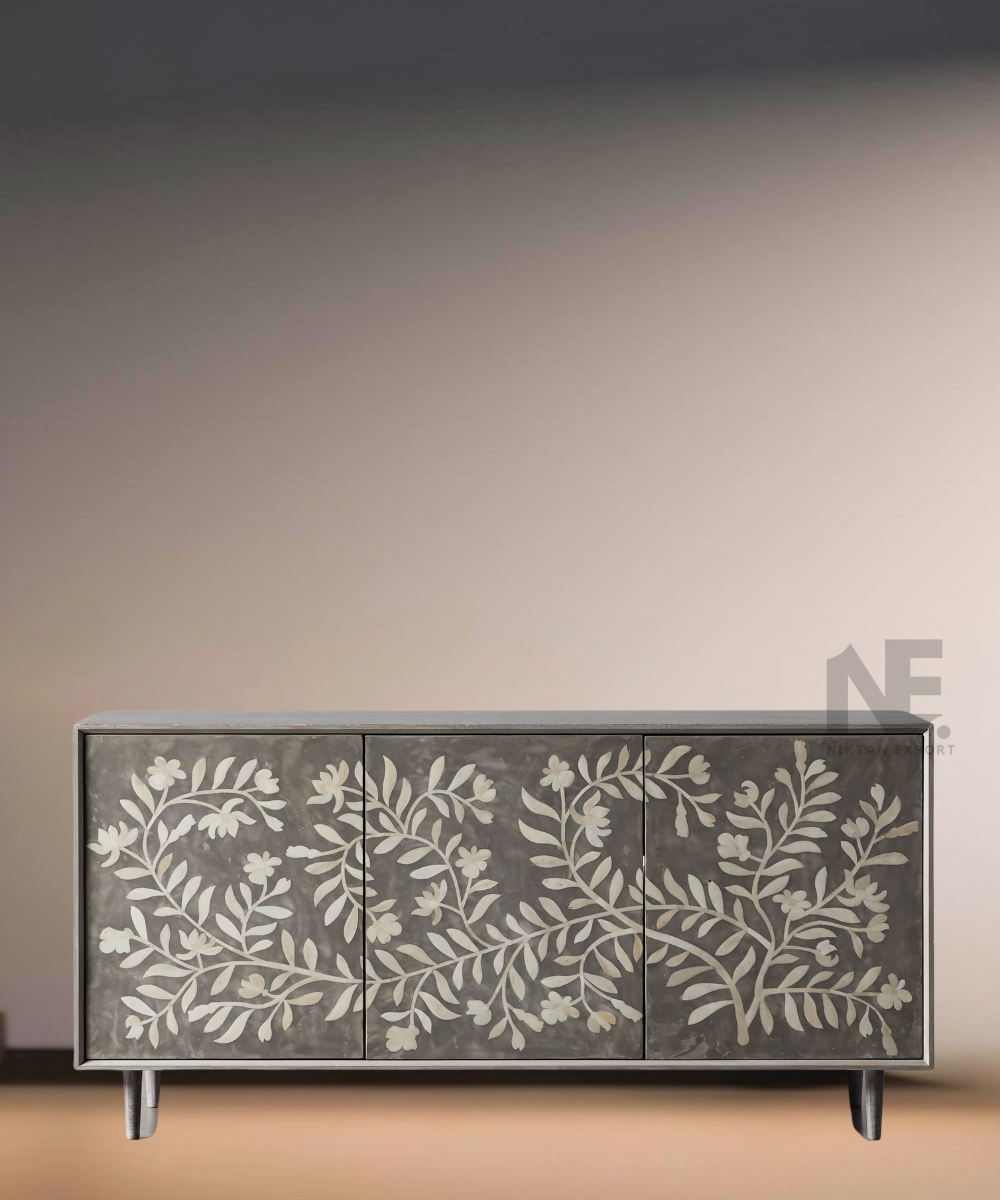 Front view of grey bone inlay media console with floral design