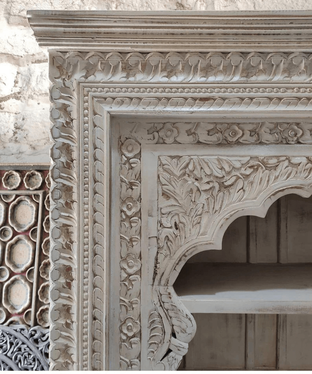 Rustic Wooden Bookshelf with Carved Details