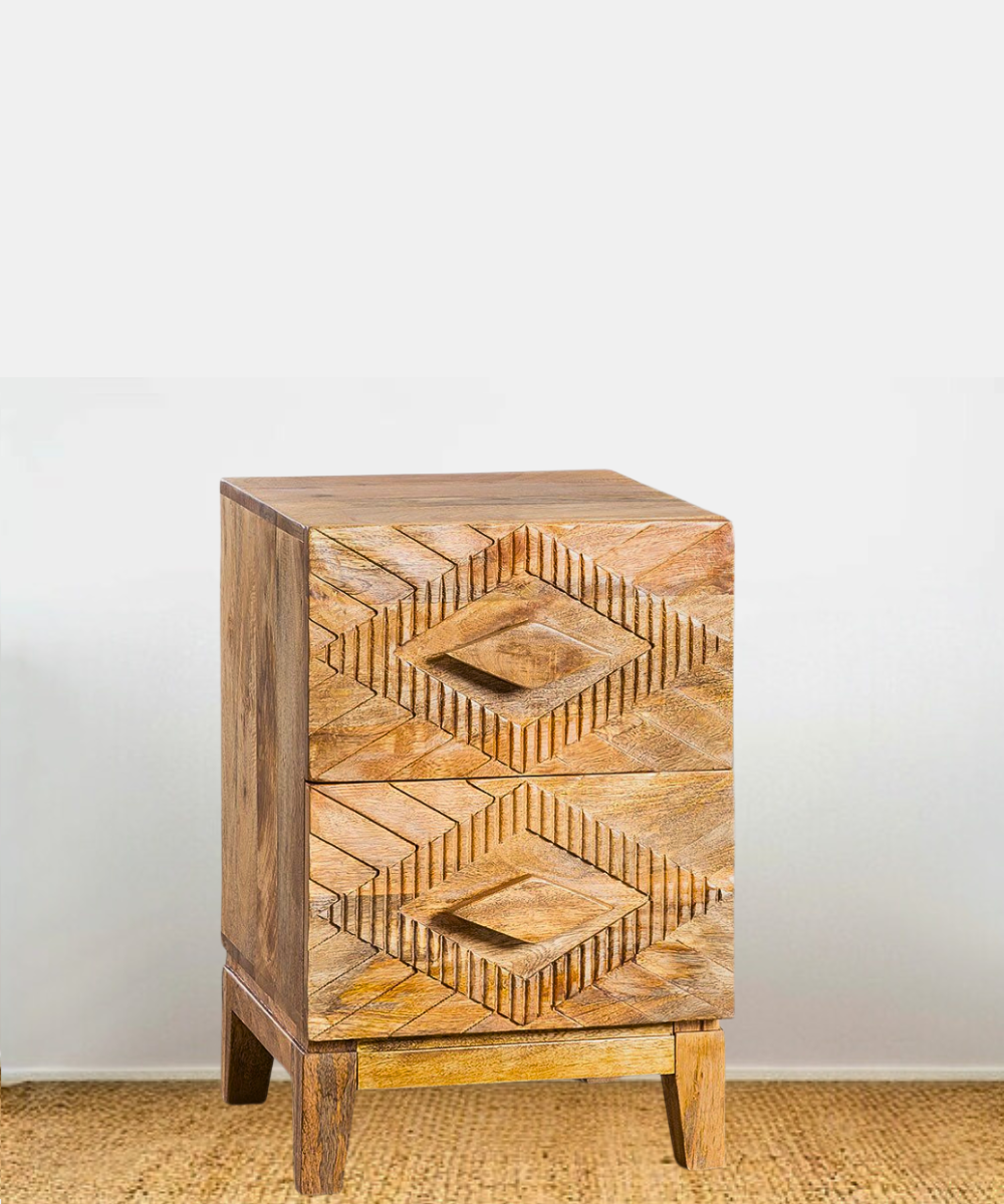 Close-up of ethnic bohemian carvings on drawer fronts