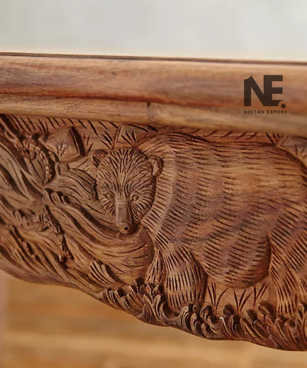 Ornately carved apron of a wooden dining table