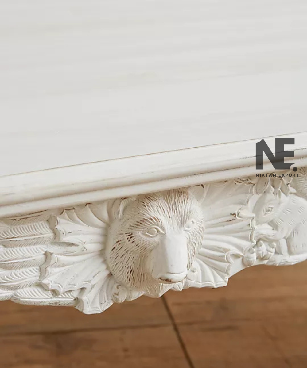 Traditional dining table with sculpted animal details