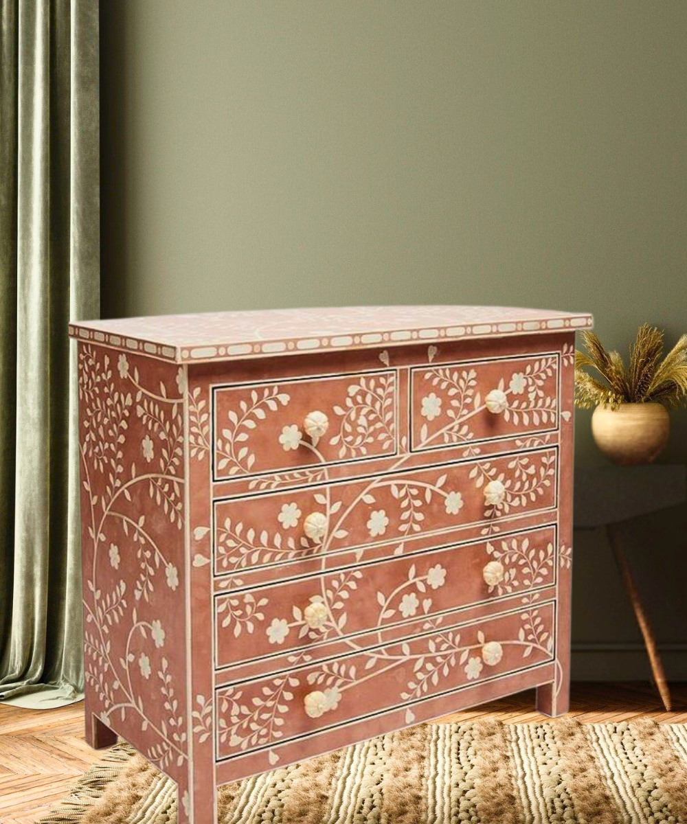 Close-up of floral bone inlay pattern in pink