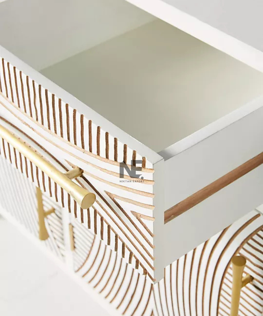 White sideboard with three upper drawers and gold accents