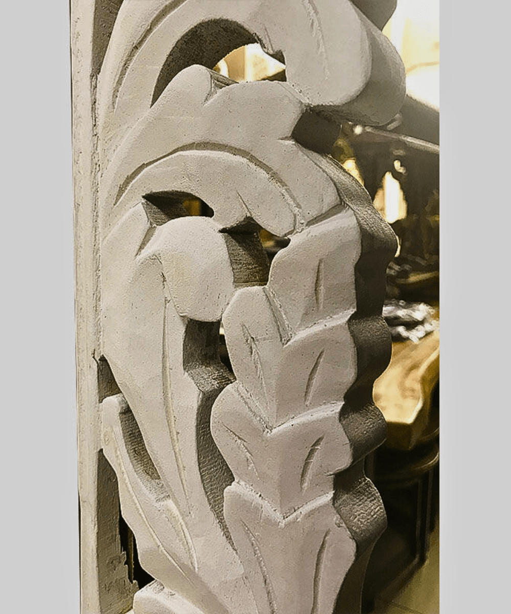 Close-up of intricate hand-carved floral details