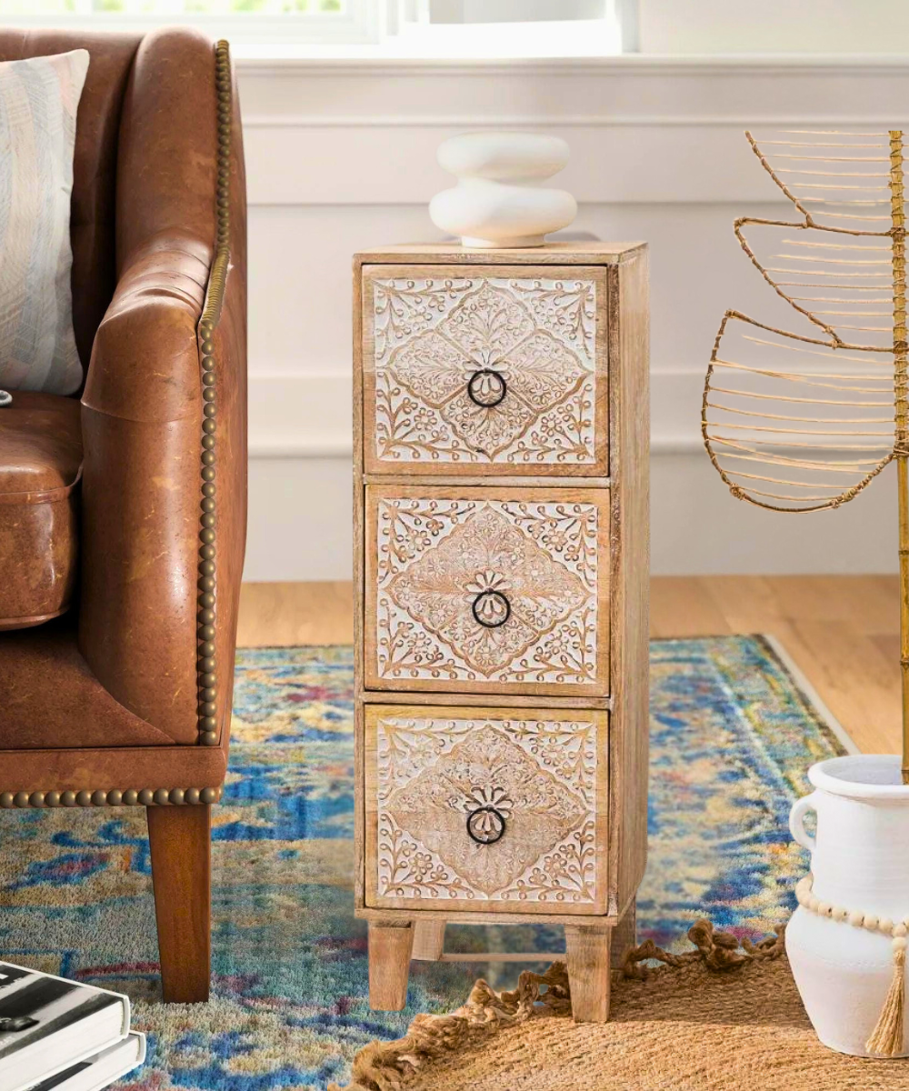 Hand-carved solid wood chest of drawers with intricate boho patterns.