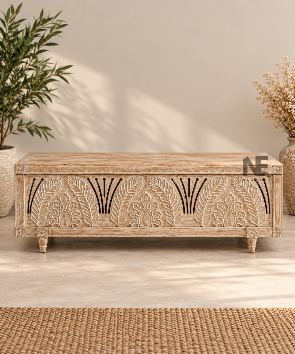 Whitewashed carved wooden storage trunk with floral front design