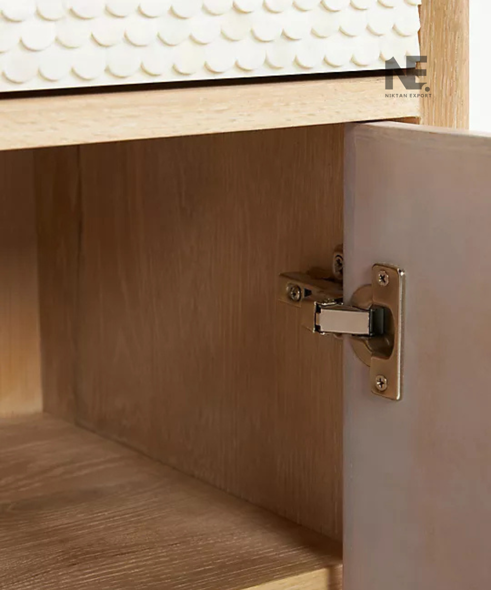 Slim metal legs on a modern cream cabinet