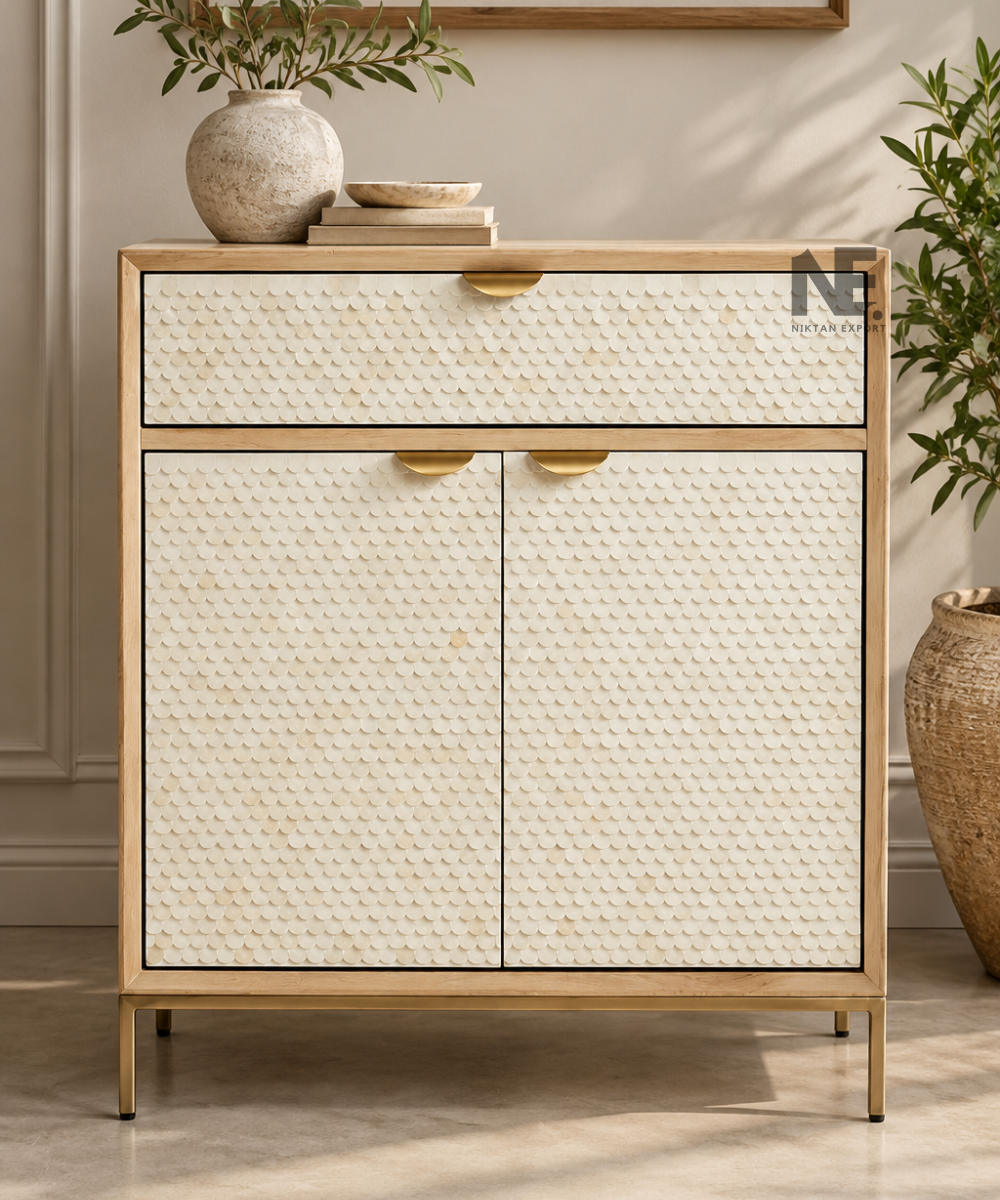 Cream scalloped storage cabinet with gold-tone legs