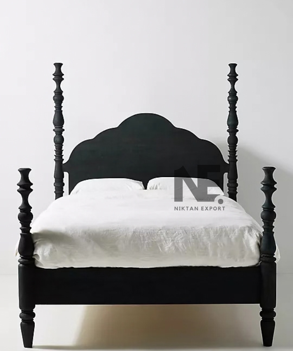 Black bed frame with decorative turned wooden posts