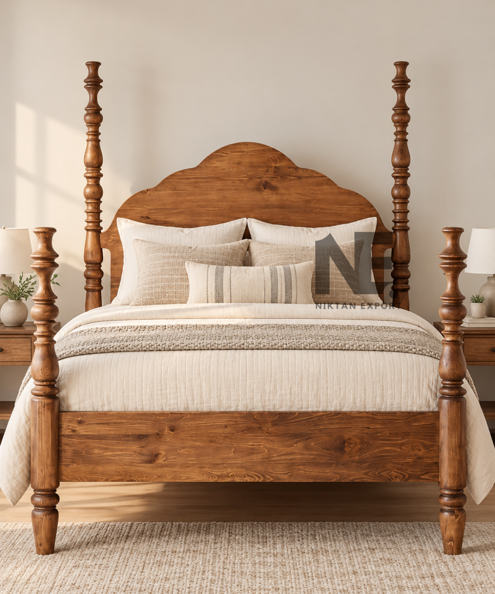 Black four poster bed styled with white bedding