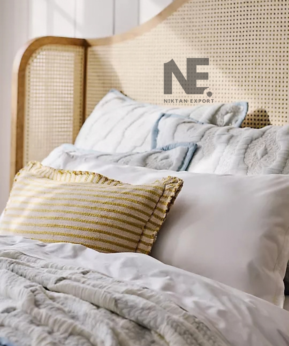 Matching cane headboard and footboard on a wooden bed