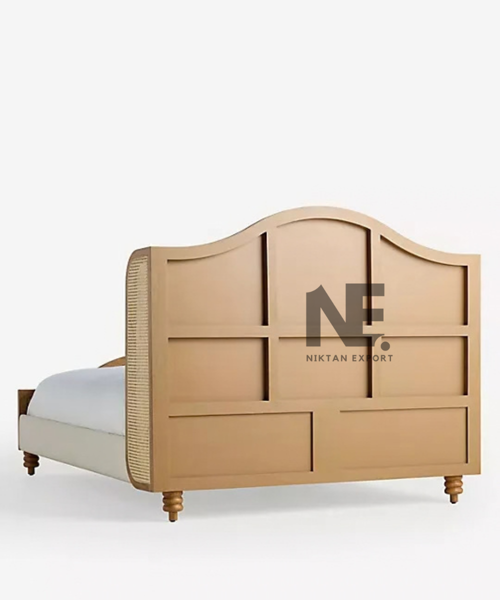 Curved wooden headboard with natural cane inset