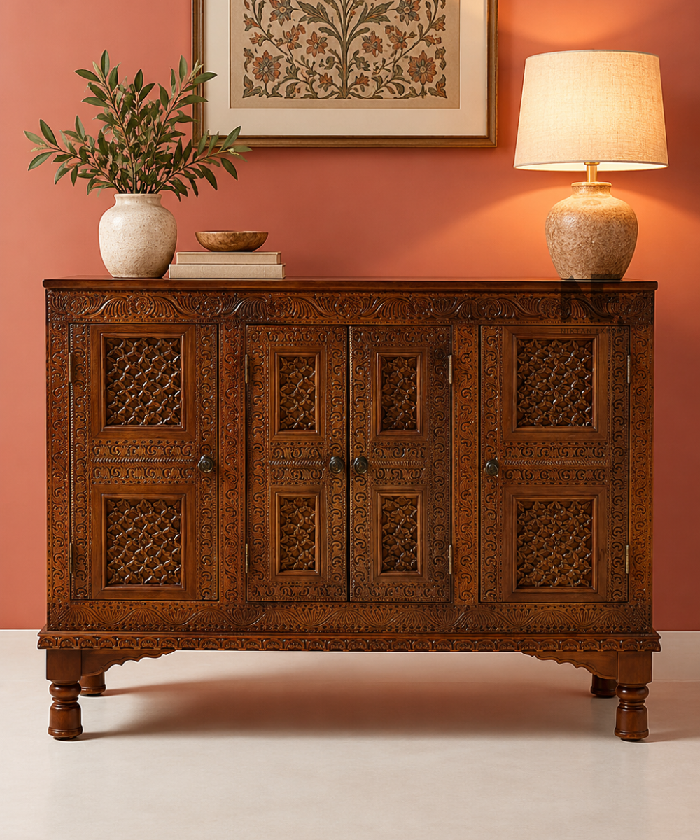 Front view of ornate dark brown carved wooden cabinet