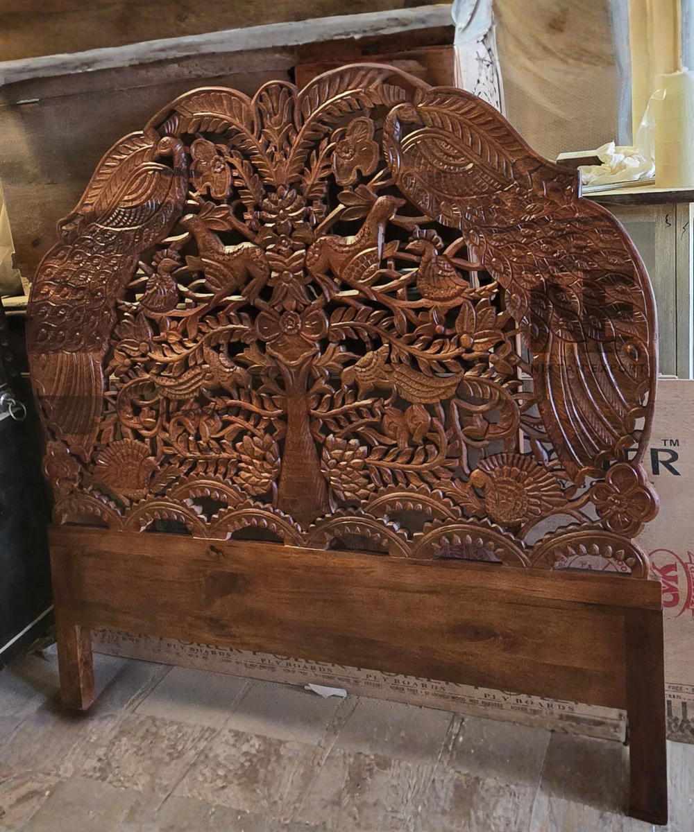 Handcrafted woodland design headboard for a bedroom
