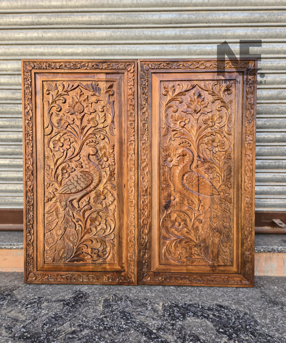 Front view of decorative wooden peacock carving panels