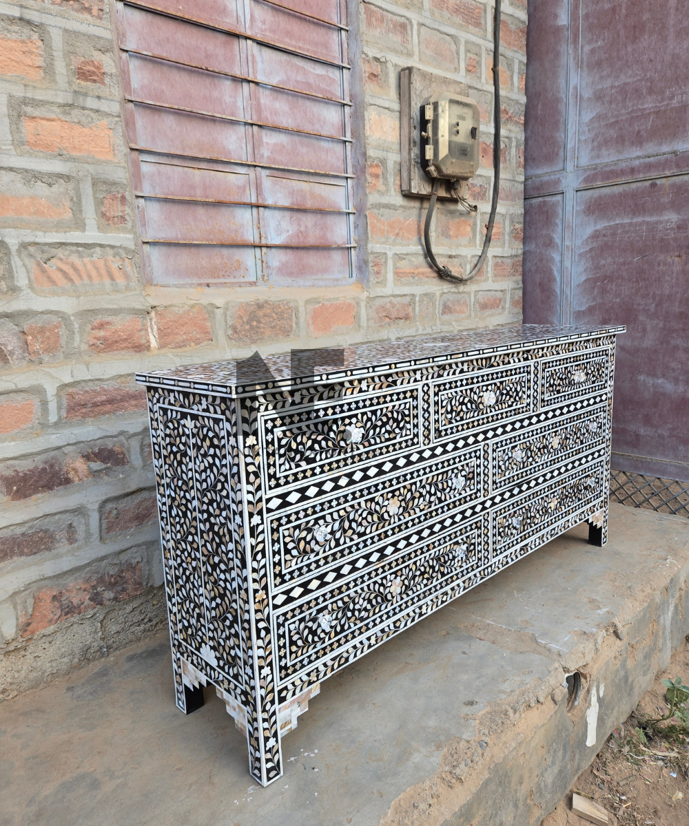 Front view of black and ivory mother of pearl sideboard