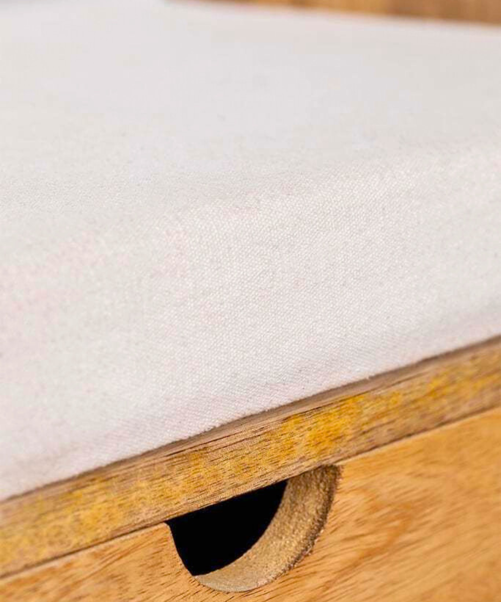 Wooden trunk used as a coffee table in a boho living room