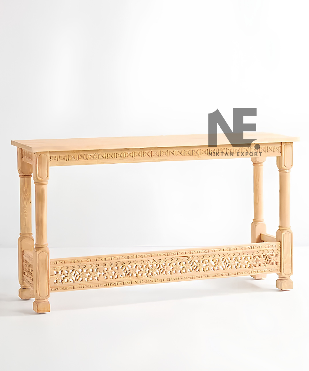 Close-up of geometric carving along console table apron