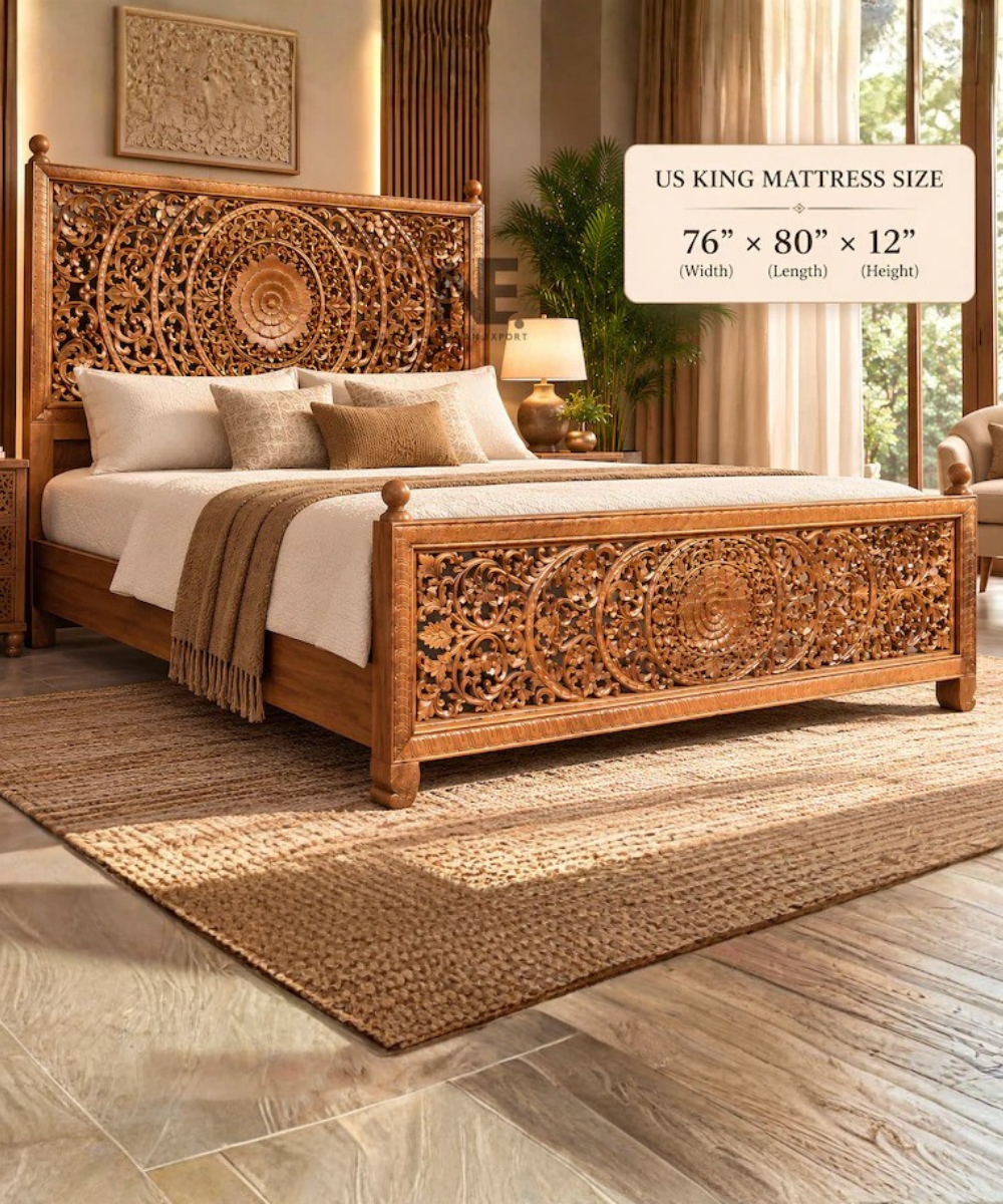 Ornate carved footboard on handmade wooden king bed