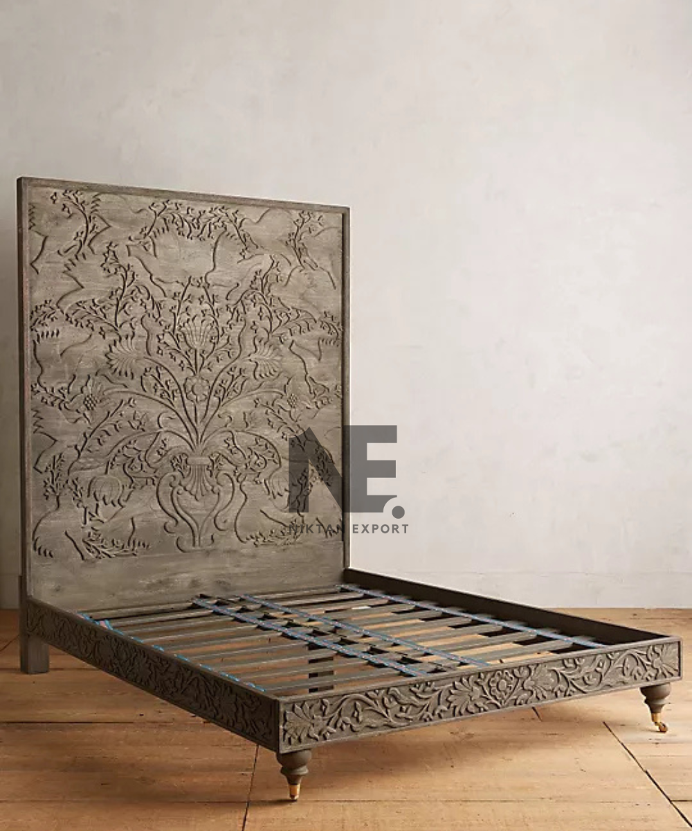 Decorative carved headboard on a wooden bed