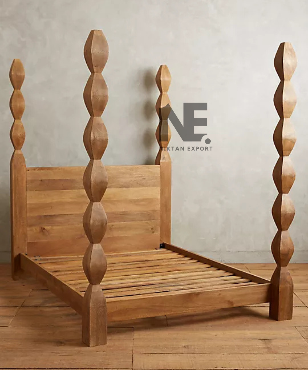 Front view of a wooden four poster bed